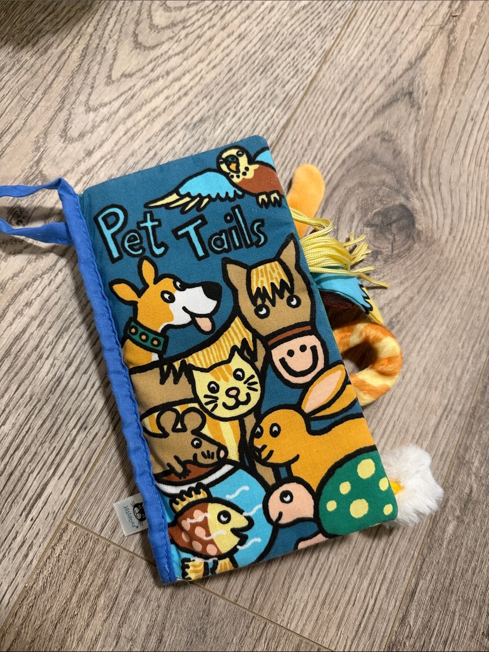 Jellycat Blue and Yellow 'Pet Tails' Plush Activity Toy